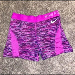 Purple nike pros.